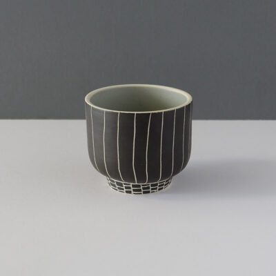 small-black-footed-pinstripe-studio-pottery-vessel